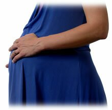 Picture of a pregnant lady holding her bump